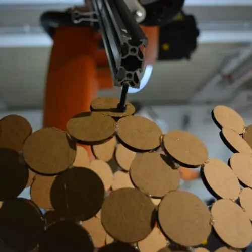 Cooperative Robotics Assembly; Each cardboard disc had a small dot that indicates its center. Jonathan Malott, Austin Texas Architecture
